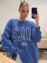 Sudadera holgada informal de manga larga con cuello redondo y estampado de letras